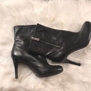Black leather coach boots